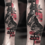 CNX Tattoo Trash-Polka Schwarz Rot Farbklecksen Tattoo Arm von CNX Tattoo Berlin Prenzlauer Berg