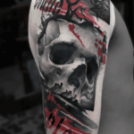 CNX Tattoo Totenkopf Trash-Polka Schwarz Rot Farbklecksen Tattoo Arm von CNX Tattoo Berlin Prenzlauer Berg