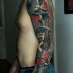 CNX Tattoo Trash-Polka Schwarz Rot Farbklecksen Tattoo Arm von CNX Tattoo Berlin Prenzlauer Berg