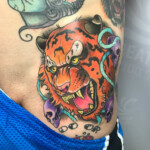 cnx tattoo Tiger Tattoo Neotraditional Farbig an der Hüfte von CNX Tattoo Berlin Prenzlauer Berg