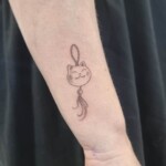 Asiatische Katze Finleine Filigran Tattoo Unterarm von CNX Tattoo Berlin Prenzlauer Berg