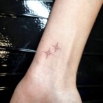 Stern Fineline Filigran Tattoo Handgelenkl von CNX Tattoo Berlin Prenzlauer Berg