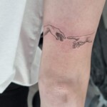 Fineline Tattoo Arm von CNX Tattoo Berlin Prenzlauer Berg